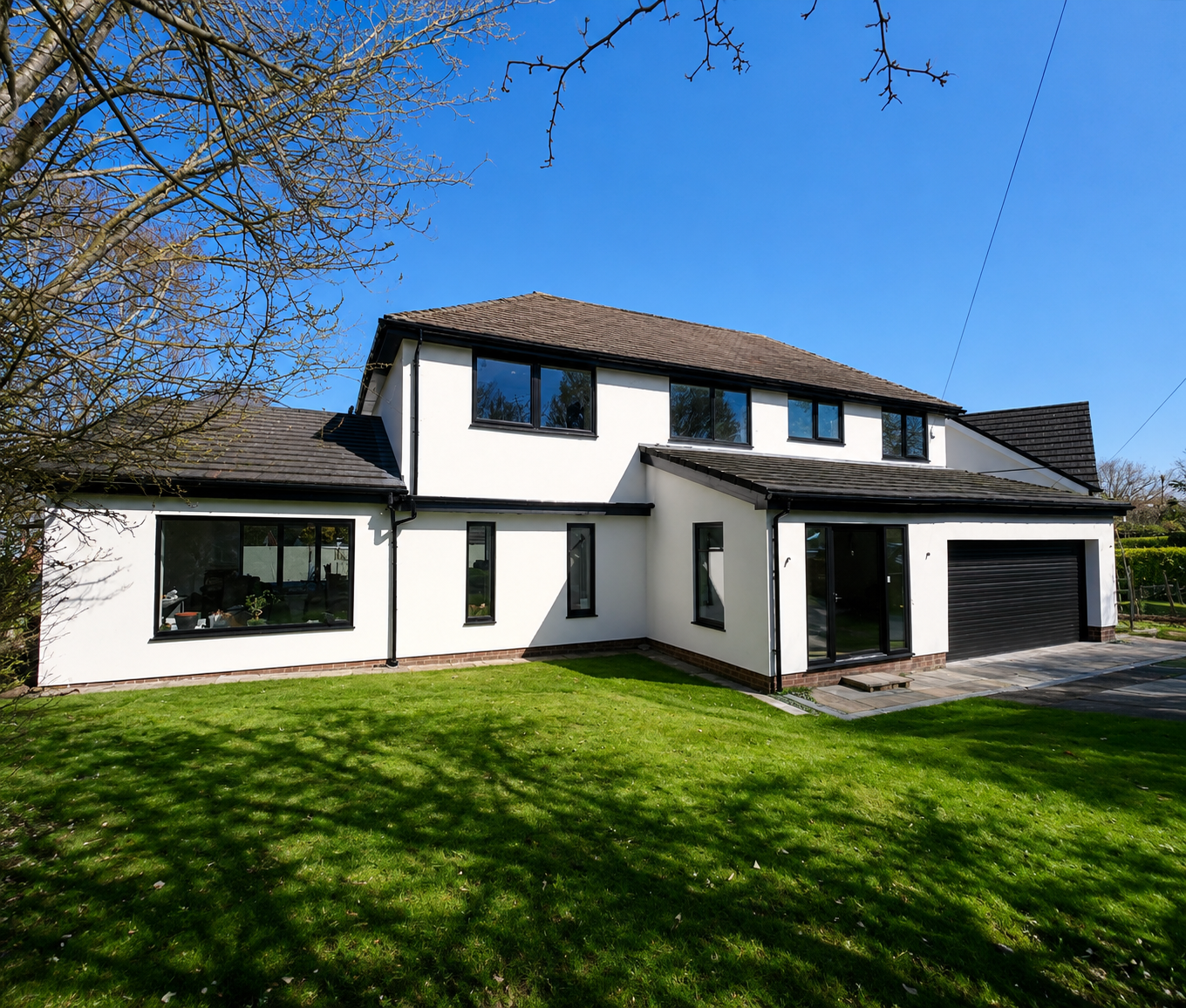 White rendered detached home